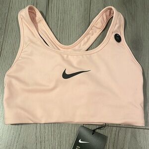 Nike light pink sports bra